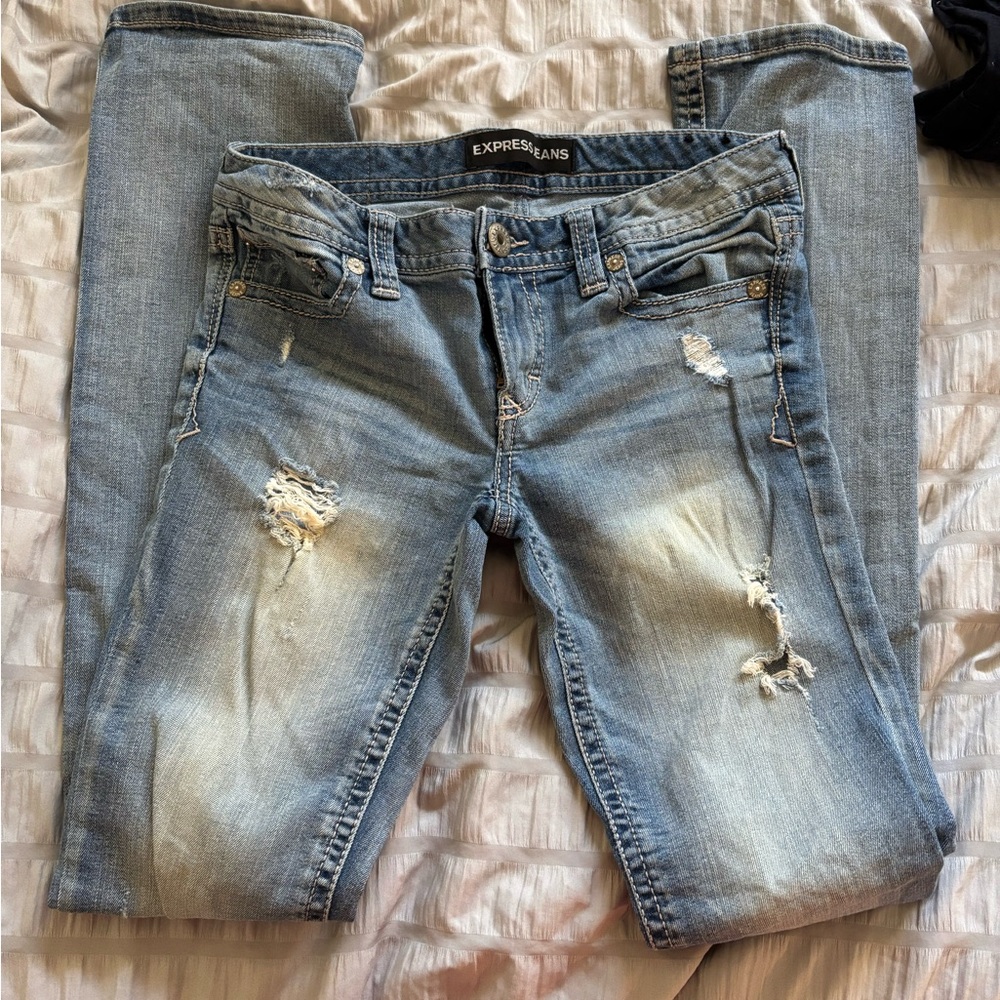 Express Distressed Blue Jeans for Women. 4 longs.